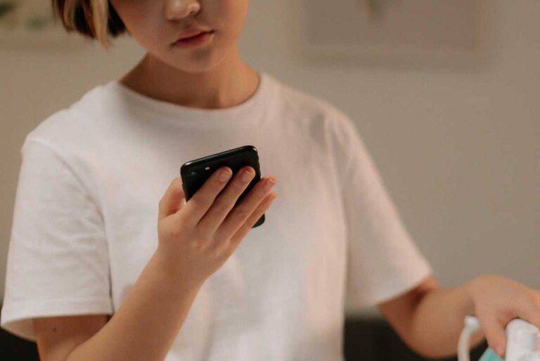 Asian using smartphone