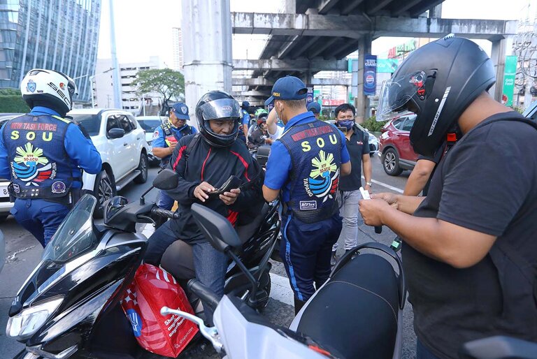 Motorists apprehended by the MMDA for illegally using EDSA Buslane