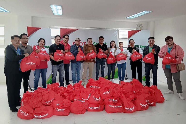 PLDT, Smart give aid to Egay hit communities